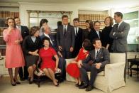 <p>Portrait of members of the Kennedy family at their home on the night after John F. Kennedy won the 1960 US Presidential election, Sitting, from left, Eunice Shriver (on chair arm), Rose Kennedy, Joseph Kennedy (on chair arm), Jacqueline Kennedy (head turned away from camera), and Ted Kennedy. Back row, from left, Ethel Kennedy, Stephen Smith, Jean Smith, John F. Kennedy, Robert F. Kennedy, Pat Lawford, Sargent Shriver, Joan Kennedy, and Peter Lawford. </p>