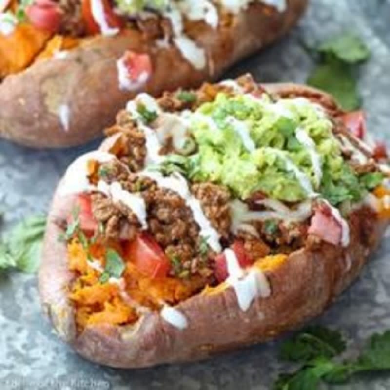 <p>Belle of the Kitchen</p><p>These Taco Stuffed Sweet Potatoes will take your Cinco de Mayo night to a new level!</p><p><strong>Get the recipe: </strong><a href="https://belleofthekitchen.com/taco-stuffed-sweet-potatoes/" rel="nofollow noopener" target="_blank" data-ylk="slk:Taco Stuffed Sweet Potatoes;elm:context_link;itc:0;sec:content-canvas" class="link rapid-noclick-resp"><strong>Taco Stuffed Sweet Potatoes</strong></a></p><p><strong>Related: <a href="https://parade.com/847827/lyubabrooke/mexican-appetizers-cinco-de-mayo/" rel="nofollow noopener" target="_blank" data-ylk="slk:19 Easy Cinco De Mayo Appetizers;elm:context_link;itc:0;sec:content-canvas" class="link rapid-noclick-resp">19 Easy Cinco De Mayo Appetizers</a></strong></p>