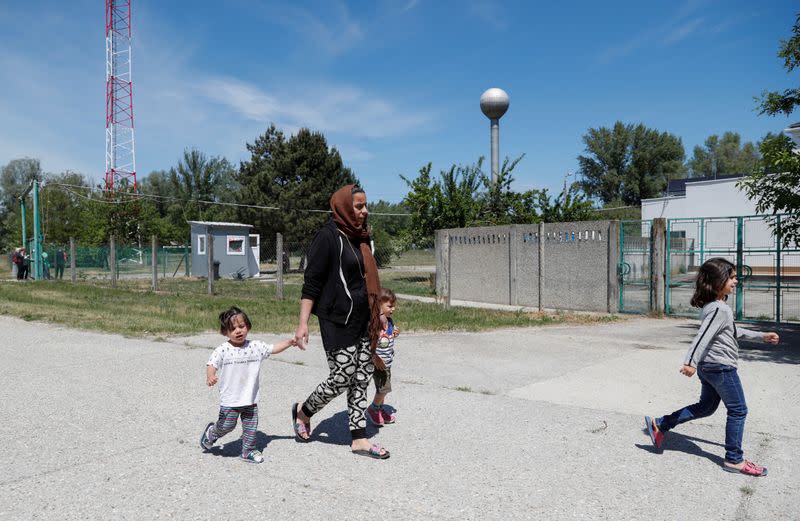 Migrants at a migrant reception centre in Vamosszabadi