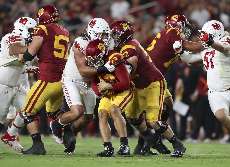 Utah Utes defensive end Van Fillinger (7) sacks USC Trojans quarterback Caleb Williams at the Los Angeles Memorial Coliseum on Saturday, Oct. 21, 2023. | Laura Seitz, Deseret News