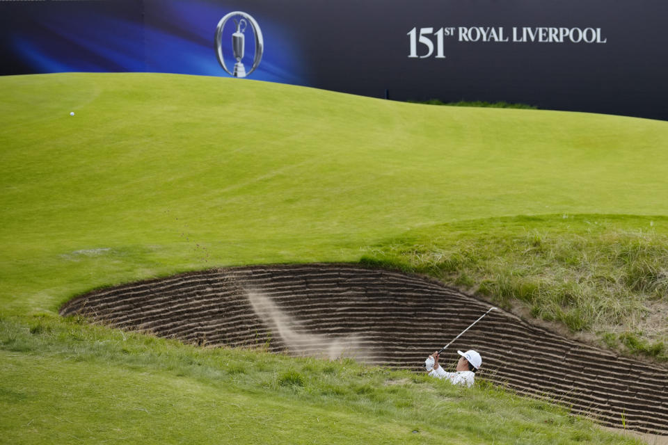 England's Matt Fitzpatrick plays out of a bunker on the 17th green during the second day of the British Open Golf Championships at the Royal Liverpool Golf Club in Hoylake, England, Friday, July 21, 2023. (AP Photo/Jon Super)