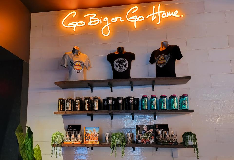 Merchandise is for sale at Guy Fieri's Kitchen + Bar in Council Bluffs.