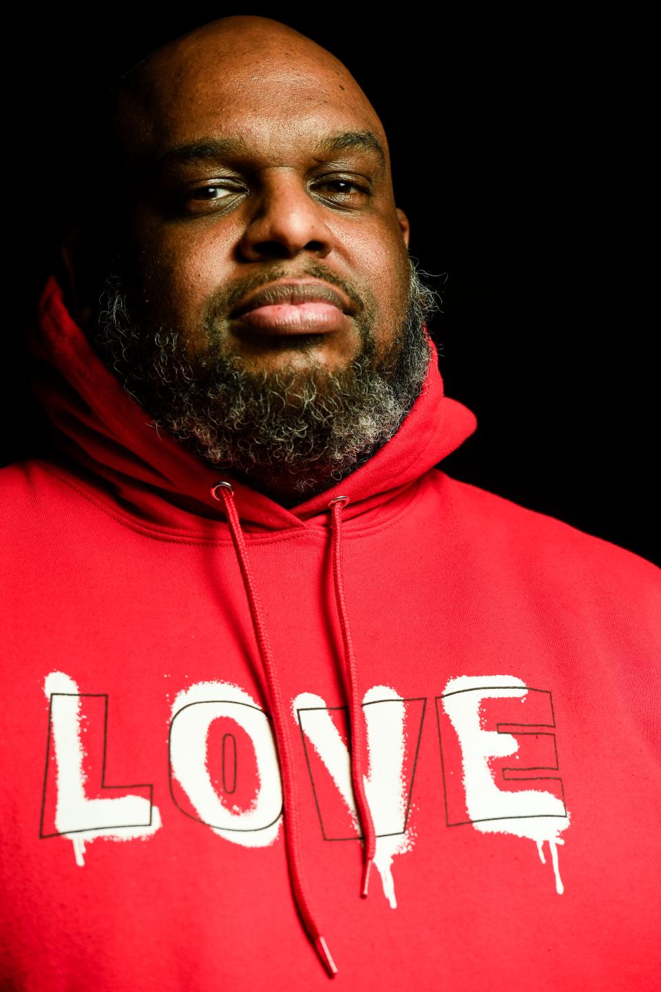 Pastor John Gray poses for a portrait in the Love Story Church, formerly Relentless Church, sanctuary on Thursday, March 28, 2024.