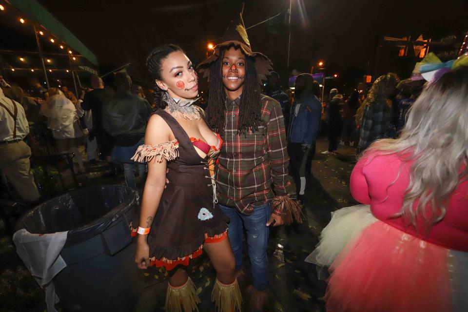 Patrons pose for a photo during the annual trolly square Halloween Loop Saturday, Oct. 27, 2018, at Kelly's Logan House in Wilmington.