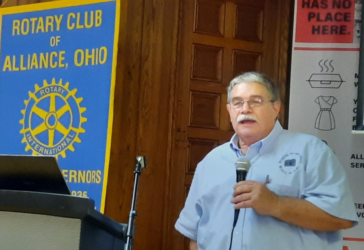 The Rev. Rich Hall speaks during a luncheon meeting of Alliance Rotary Club.