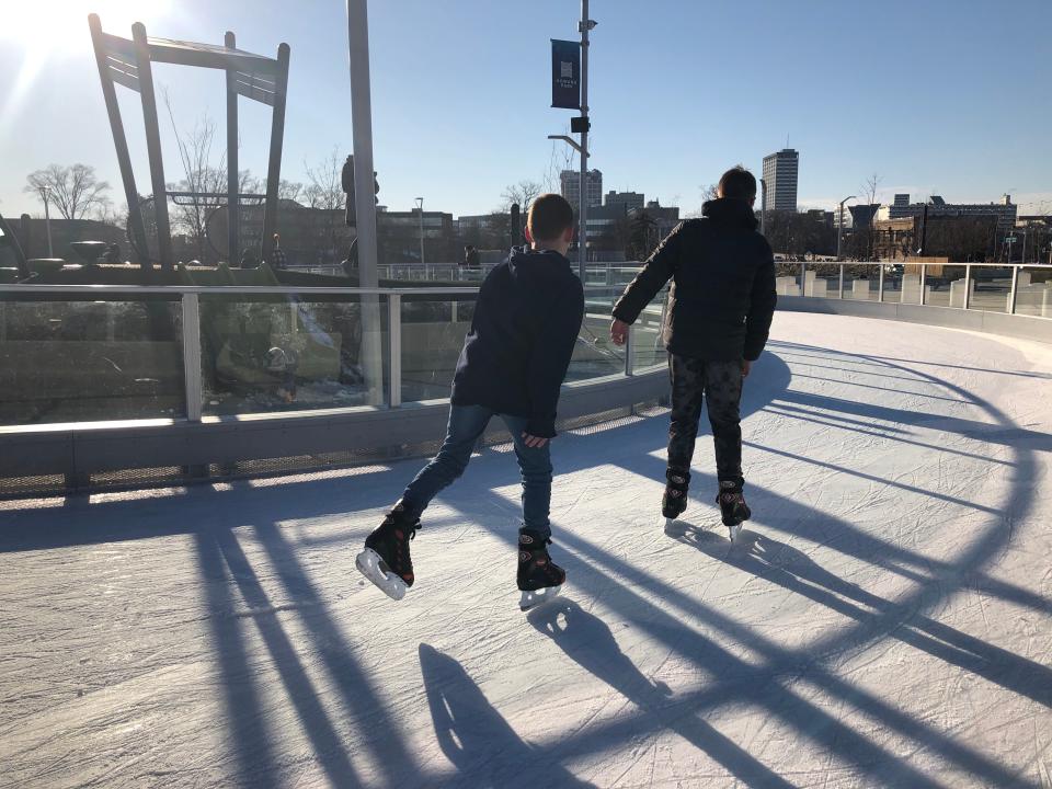 Skaters carve the ice at South Bend's Howard Park ice trail and pond last winter. Lessons at the park will start soon.