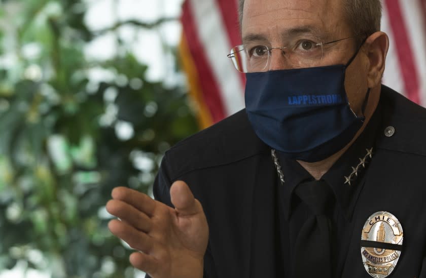 LOS ANGELES, CA - JANUARY 29, 2021: LAPD Chief Michel Moore talks about extremism in the police ranks during an interview with reporter inside his office at LAPD Headquarters in downtown Los Angeles. Moore discussed what actions the LAPD is taking in relation to assessing whether extremism exists among its rank and file and command staff after reports that many police officers were in Washington D.C. on January 6, including some LAPD officers. (Mel Melcon / Los Angeles Times)