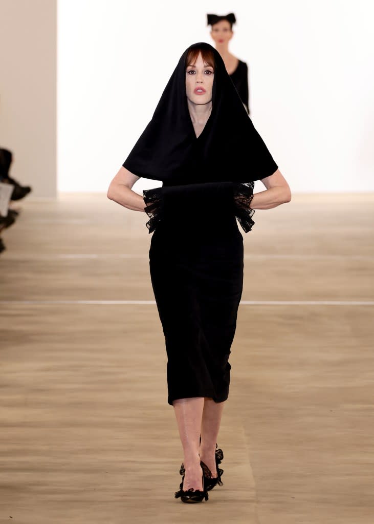 Ringwald opened the show in a black velvet number with a hood and hand muff. Getty Images for NYFW: The Shows