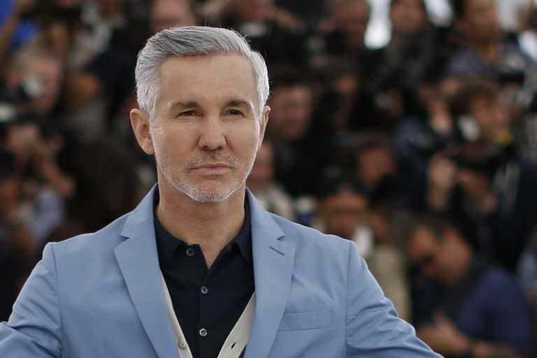 Australian director Baz Luhrmann poses on May 15, 2013 during a photocall for his film "The Great Gatsby" ahead of the opening of the 66th edition of the Cannes Film Festival on May 15, 2013 in Cannes. Stars of "The Great Gatsby" rolled into Cannes for the European premiere of Luhrmann's controversial 3D epic, which was to kick off the world's most prestigious film festival late Wednesday