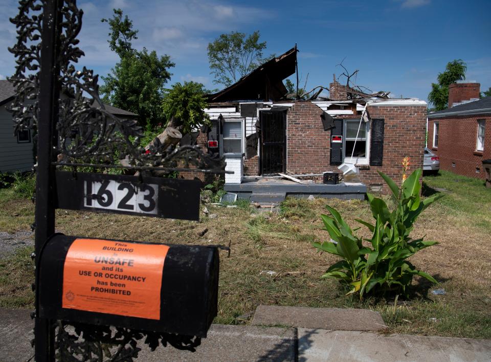 A sign says a home has been condemned Thursday, Aug. 13, 2020 in Nashville, Tenn. Many homeowners have not be able to make the necessary repairs or rebuild after a tornado ripped through the area March 3, 2020 demolishing homes early that morning.