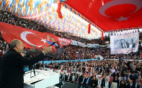 Turkey's President Recep Tayyip Erdogan addresses the members of his ruling party in Giresun, Turkey