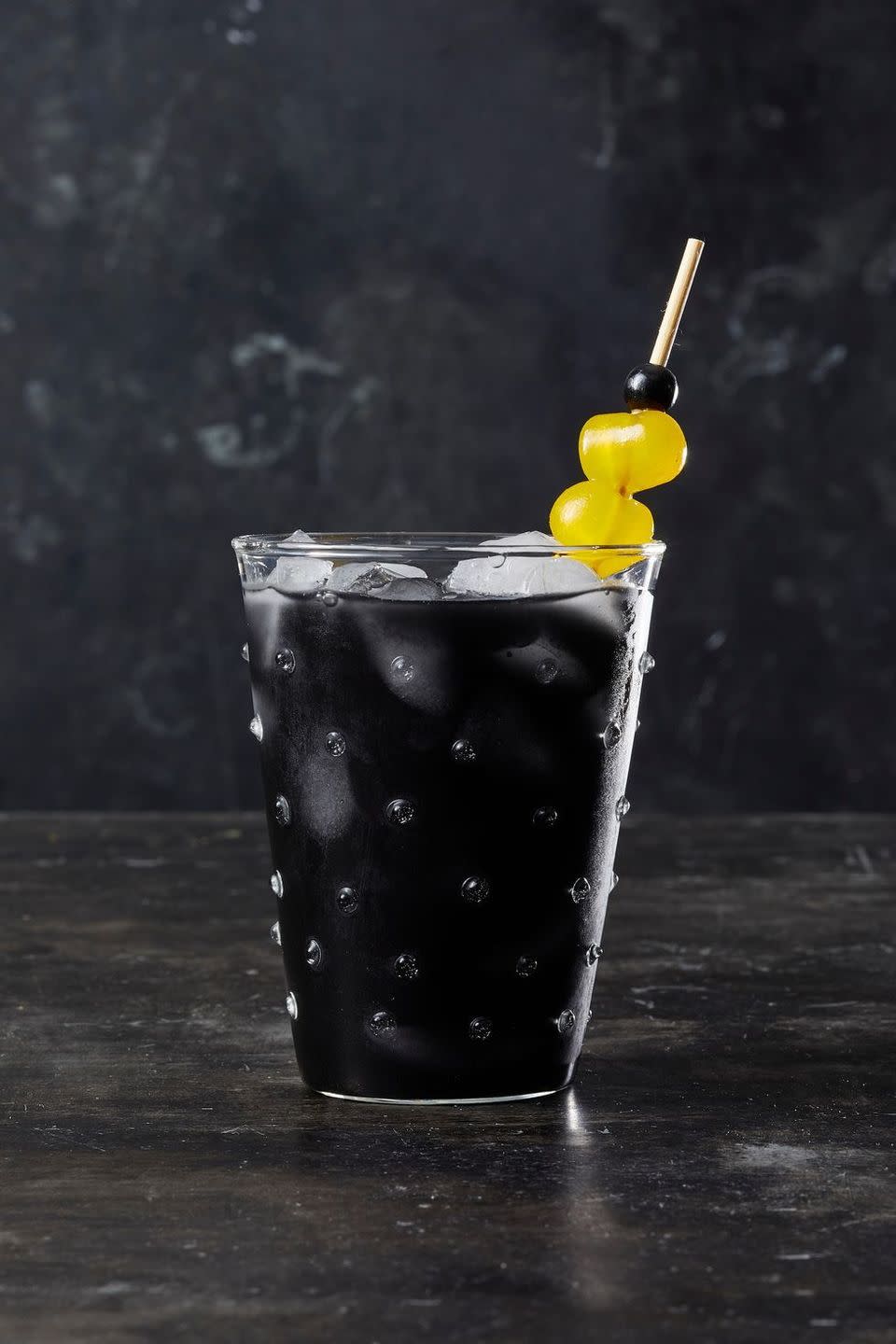 <p>A sprinkle of activated charcoal dresses up this childhood favorite for Halloween. Add a splash of vodka if you want to make this drink a little deadly.</p><p>Get the <a href="https://www.goodhousekeeping.com/food-recipes/a28552458/black-charcoal-lemonade-recipe/" rel="nofollow noopener" target="_blank" data-ylk="slk:Black Charcoal Lemonade recipe;elm:context_link;itc:0;sec:content-canvas" class="link "><strong>Black Charcoal Lemonade recipe</strong></a>.</p>