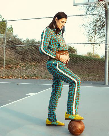 <p>April Johnston</p> Anna Petrakova holds bump on basketball court