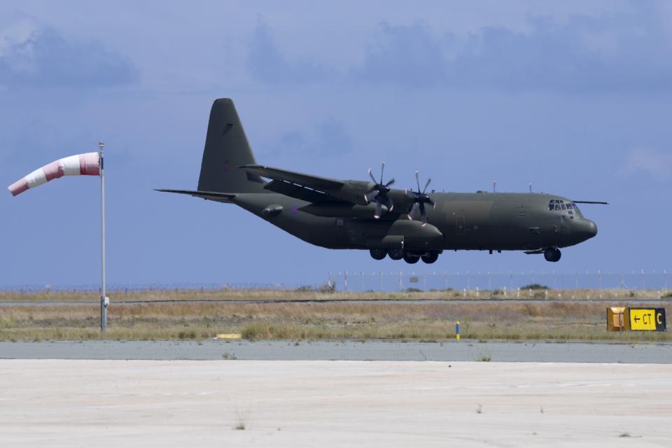 A British military plane lands at Larnaca airport, Cyprus, on Thursday, April 27, 2023. About 140 people including British and other citizens from European Union countries, arrived in Cyprus after being evacuated from Sudan. (AP Photo/Petros Karadjias)