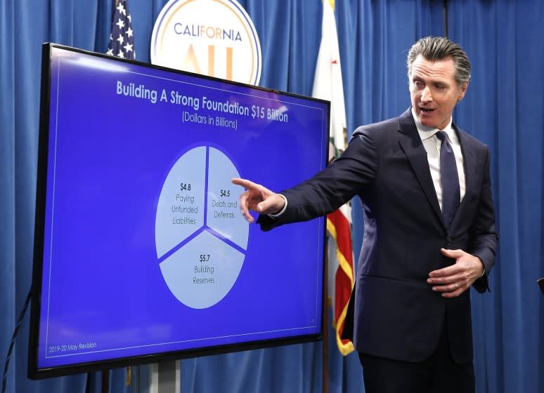 Gov. Gavin Newsom discusses his revised 2019-2020 state budget during a news conference Thursday, May 9, 2019, in Sacramento, Calif. Newsom, a Democrat, has proposed a $213.5 billion spending plan. (AP Photo/Rich Pedroncelli)