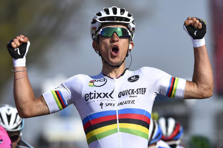 Polish world champion Michal Kwiatkowski of team Ettix - Quick-Step celebrates as he crosses the finish line to win the 50th edition of the Amstel Gold race, 258km from Maastricht to Berg en Terblijt, Netherlands, on April 19, 2015