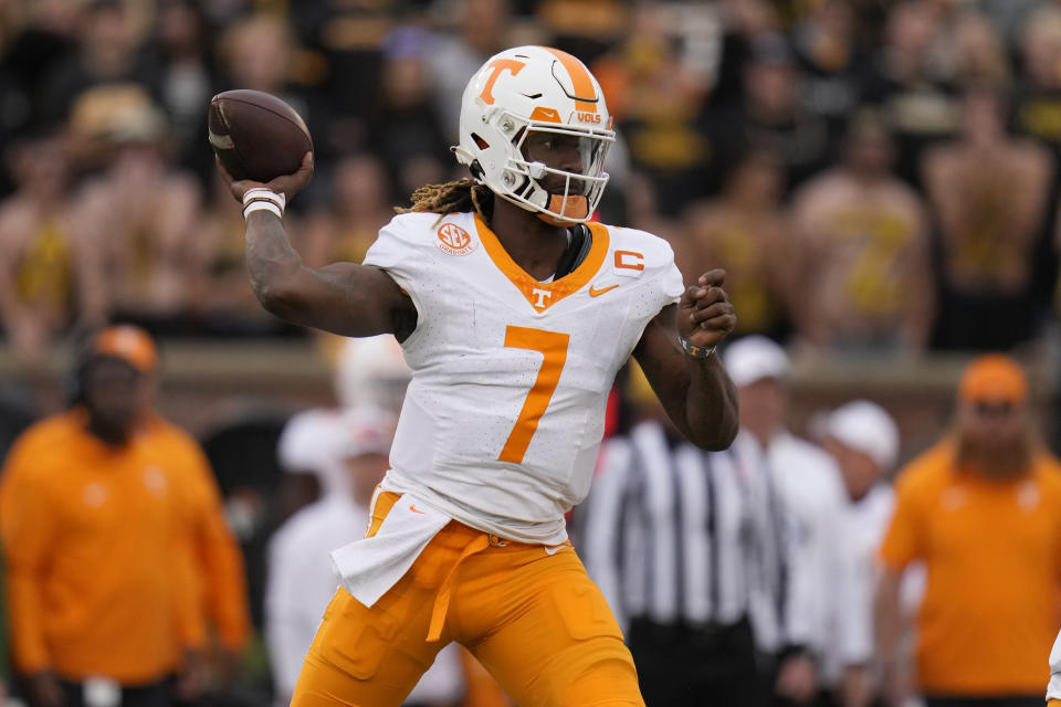 Tennessee quarterback Joe Milton III throws during the first half of an NCAA college football game against Missouri Saturday, Nov. 11, 2023, in Columbia, Mo. (AP Photo/Jeff Roberson)