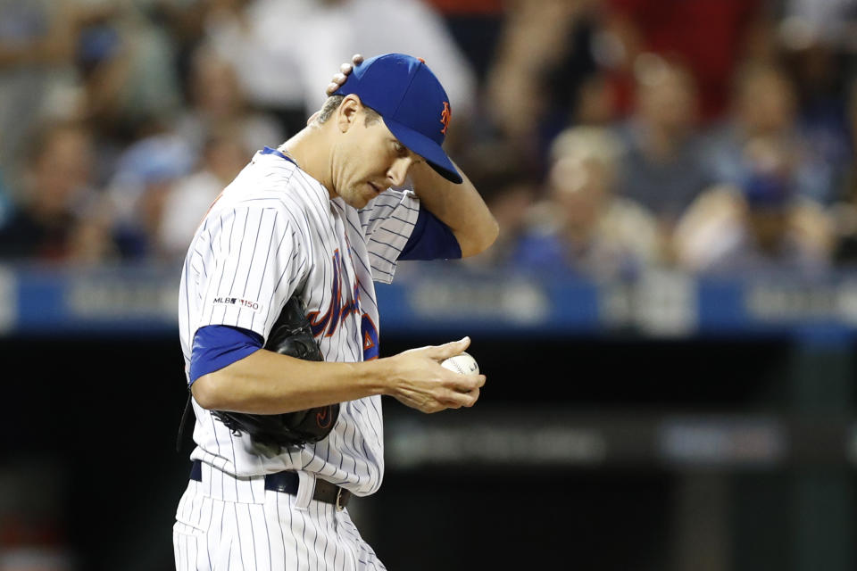 New York Mets starting pitcher Jacob deGrom reacts on the mound after allowing a three-run home run to Chicago Cubs' Victor Caratini during the seventh inning of a baseball game Thursday, Aug. 29, 2019, in New York. (AP Photo/Kathy Willens)