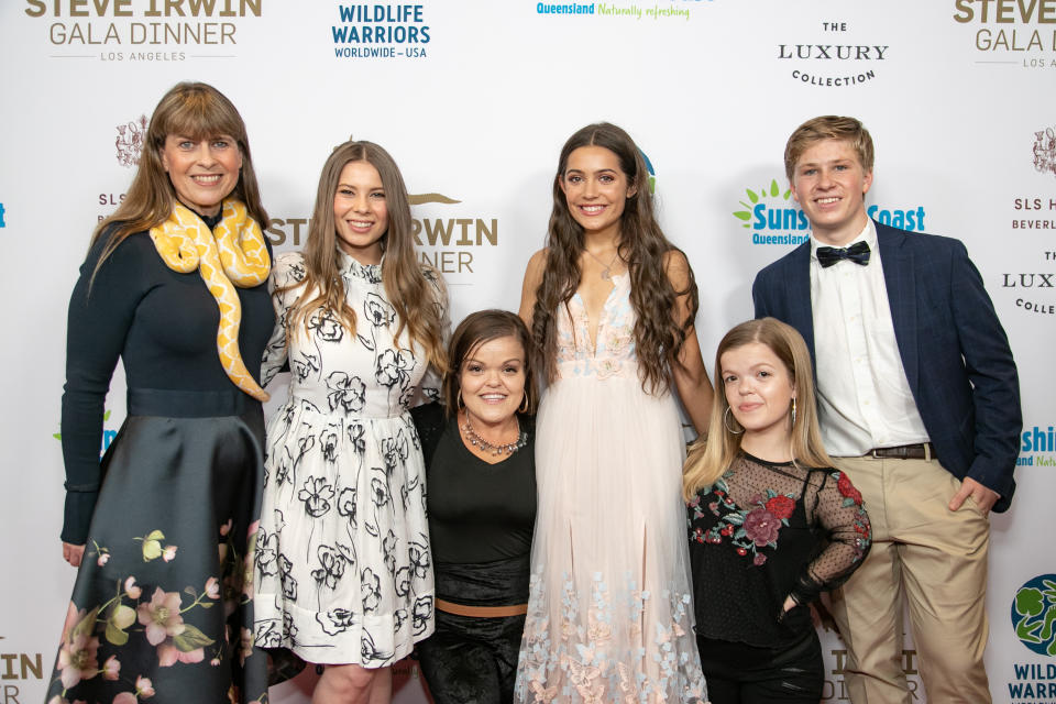 Emmy and Robert were pictured alongside his family and Christy and Autumn Gibel at the gala held in honour of his dad. Photo: Getty Images