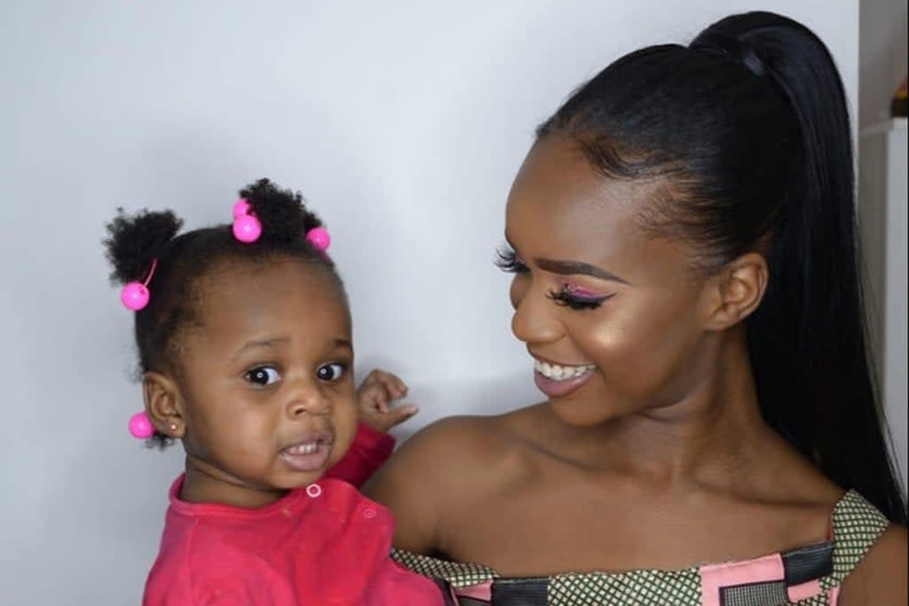 Verphy Kudi with her daughter Asiah  (.)