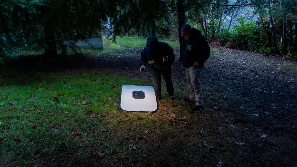 National Transportation Safety Board (NTSB) investigators examine the fuselage plug area of Alaska Airlines Flight 1282, at a property where it was recovered in Portland, Oregon. - NTSB/Handout/Reuters