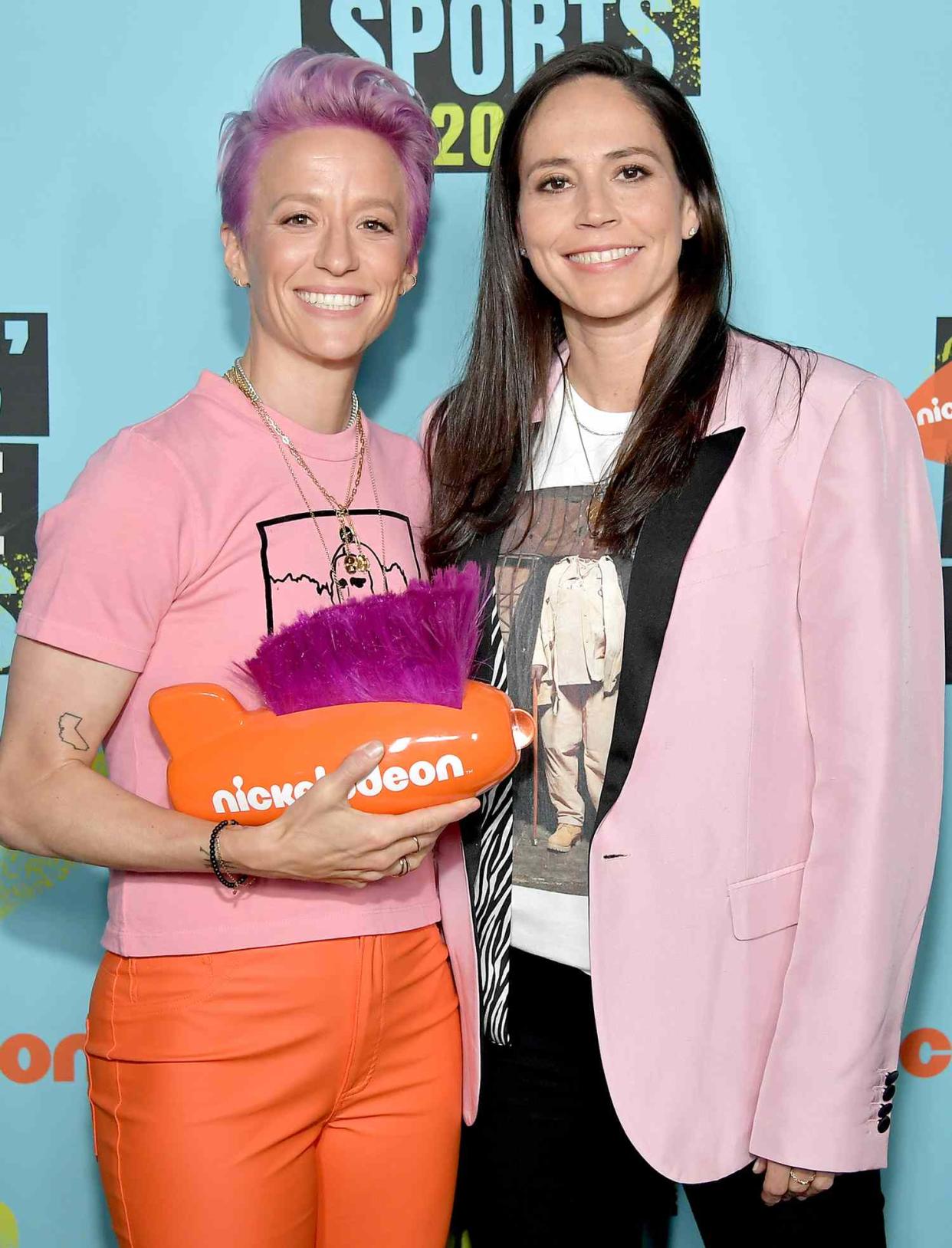 Megan Rapinoe, winner of the Generation Change award, and Sue Bird attend Nickelodeon Kids' Choice Sports 2019 at Barker Hangar on July 11, 2019 in Santa Monica, California