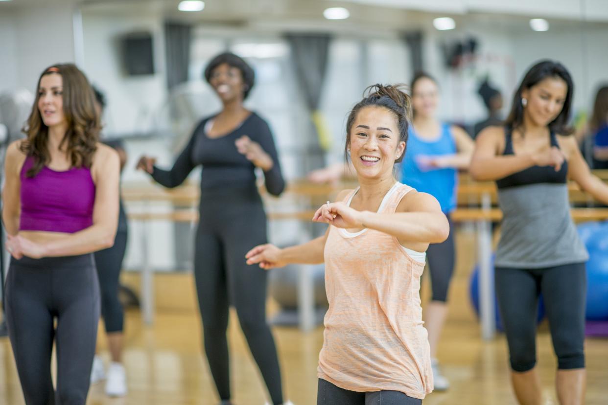 women dancing in a gym class