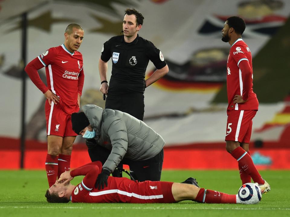 <p>Jordan Henderson suffers an injury during Liverpool’s defeat by Everton</p> (Liverpool FC via Getty Images)