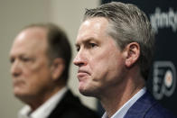 Philadelphia Flyers chairman Dave Scott, left, and Flyers general manager Chuck Fletcher take part in a news conference at the team's NHL hockey practice facility, Wednesday, Jan. 26, 2022, in Voorhees, N.J. The Flyers have lost a team-record 13 straight games.(AP Photo/Matt Rourke)