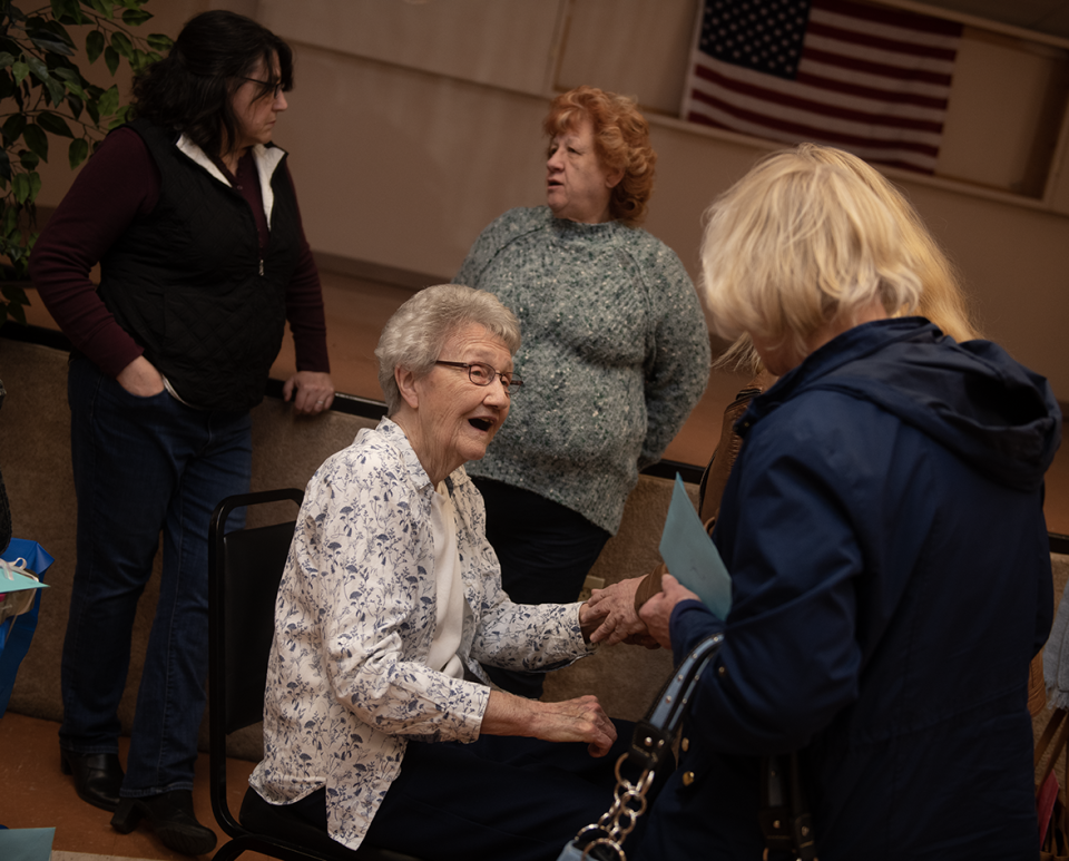 Janet Esposito retires after seven terms as the Portage County Auditor. Esposito visits with many well wishers.