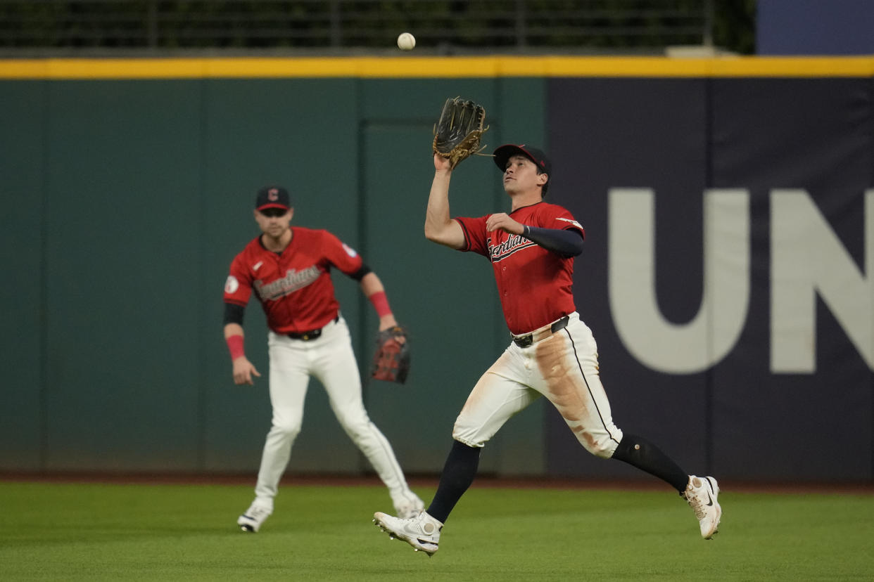 Cleveland Guardians right fielder Will Brennan catches a fly ball for an out against Minnesota Twins' Will Castro in the fourth inning of a baseball game Monday, Sept. 16, 2024, in Cleveland. (AP Photo/Sue Ogrocki)