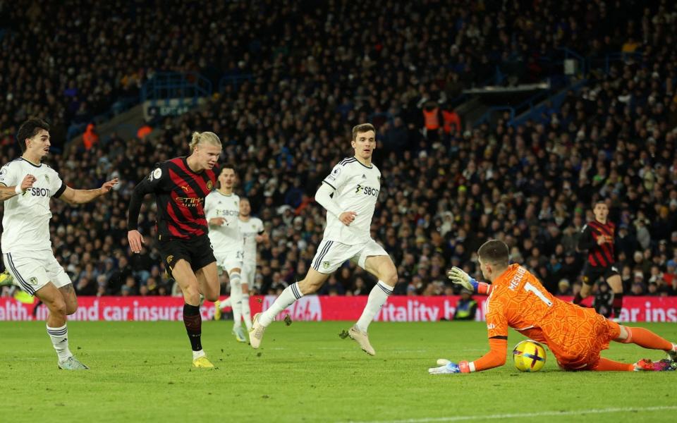 Leeds United's Illan Meslier saves a shot from Manchester City's Erling Braut Haaland - REUTERS/Lee Smith