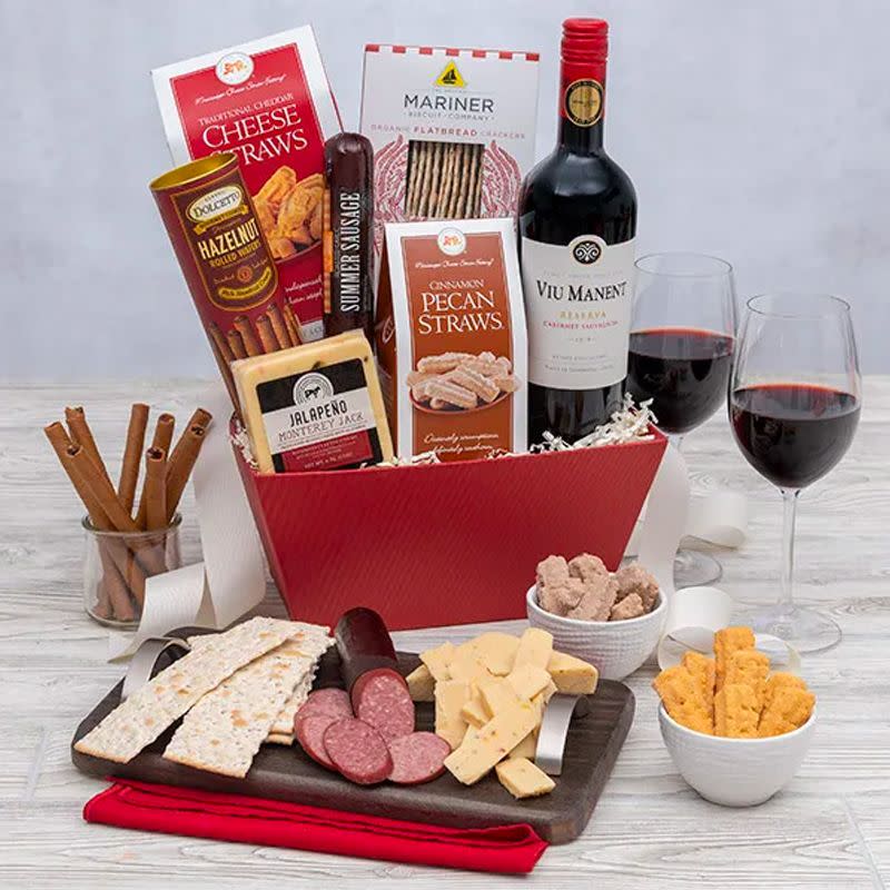 <p><a href="https://go.redirectingat.com?id=74968X1596630&url=https%3A%2F%2Fwww.gourmetgiftbaskets.com%2FClassic-Red-Wine-Gift-Basket.asp&sref=https%3A%2F%2Fwww.esquire.com%2Ffood-drink%2Fg38036473%2Fbest-wine-gift-baskets%2F" rel="nofollow noopener" target="_blank" data-ylk="slk:Shop Now;elm:context_link;itc:0;sec:content-canvas" class="link ">Shop Now</a></p><p>Classic Red Wine Gift Basket</p><p>$84.99</p><p>gourmetgiftbaskets.com</p>