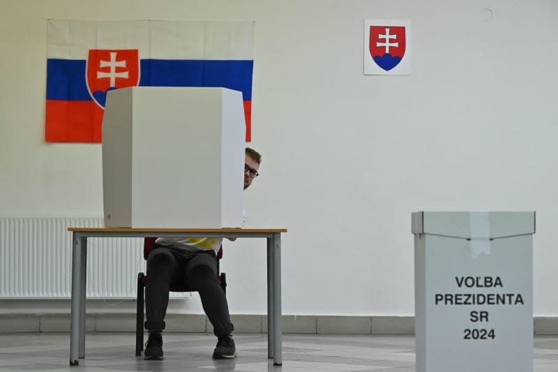 A man casts his ballot at a polling station in the village of Kuty during the 2024 Slovakia presidential election. álek Václav/CTK/dpa