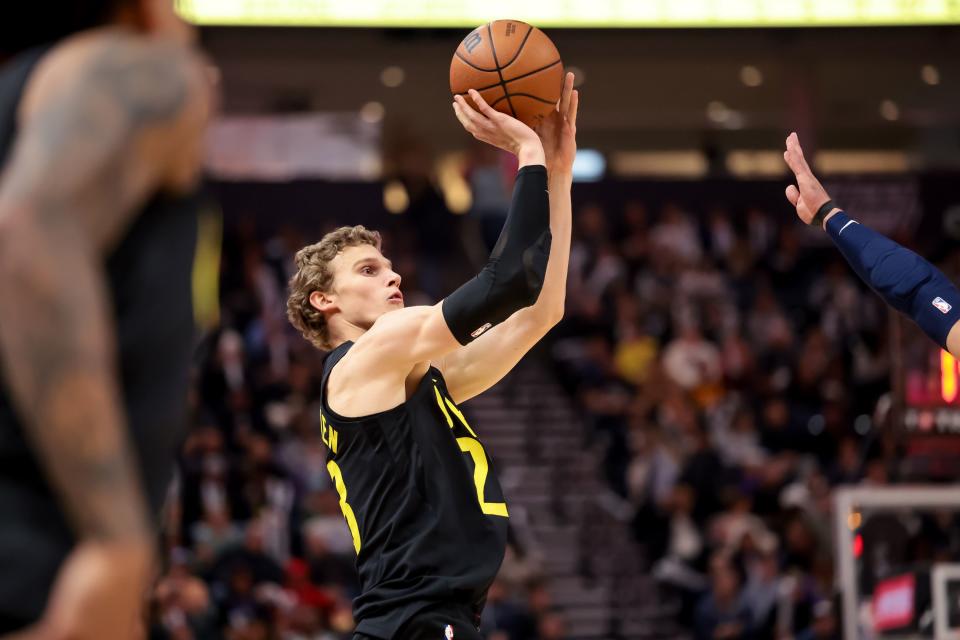 Utah Jazz forward <a class="link " href="https://sports.yahoo.com/nba/players/5769" data-i13n="sec:content-canvas;subsec:anchor_text;elm:context_link" data-ylk="slk:Lauri Markkanen;sec:content-canvas;subsec:anchor_text;elm:context_link;itc:0">Lauri Markkanen</a> (23) sinks a three during the game against the Memphis Grizzlies at the Delta Center in Salt Lake City on Wednesday, Nov. 1, 2023. | Spenser Heaps, Deseret News