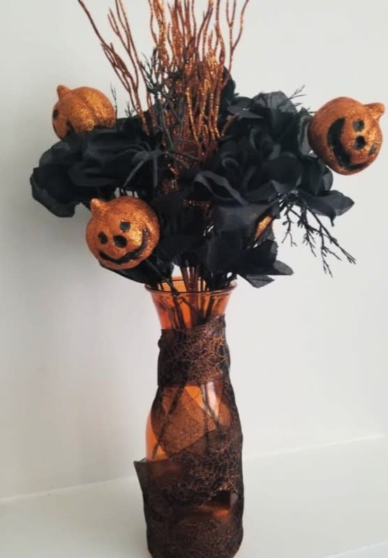 <p>The Frugal Ginger</p><p>Need to keep the Halloween decor to a budget? See how <a href="https://frugalginger.com/2019/09/diy-dollar-tree-halloween-decoration-ideas-2019/" rel="nofollow noopener" target="_blank" data-ylk="slk:The Frugal Ginger;elm:context_link;itc:0;sec:content-canvas" class="link ">The Frugal Ginger</a> creates this ghoulish bouquet with supplies all from a dollar store!</p>