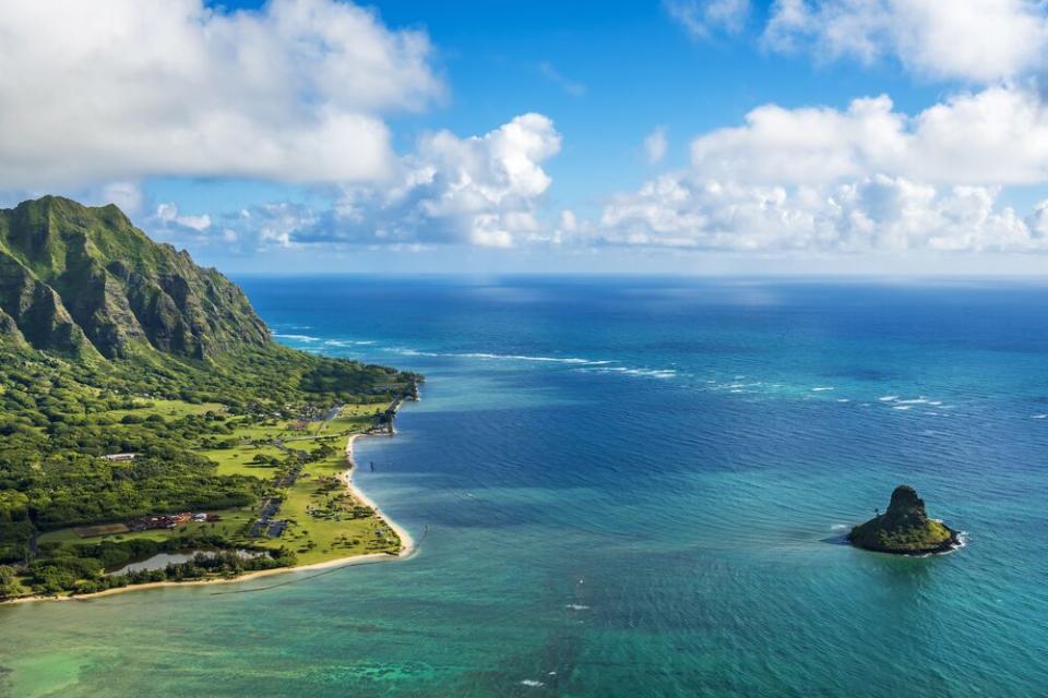 Aerial view of Kualoa Point and Mokolii, also known as Chinaman's Hat | PB57photos/Getty Images