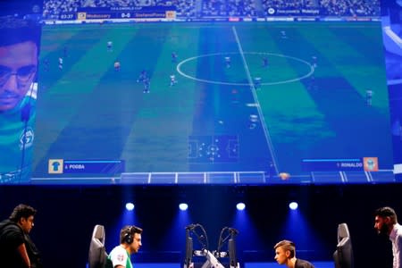 Mosaad 'MSDossary' Aldossary of Saudia Arabia competes against Stefano 'Pinna' Pinna of Belgium in the Final of the FIFA eWorld Cup 2018 at The O2 Arena in London