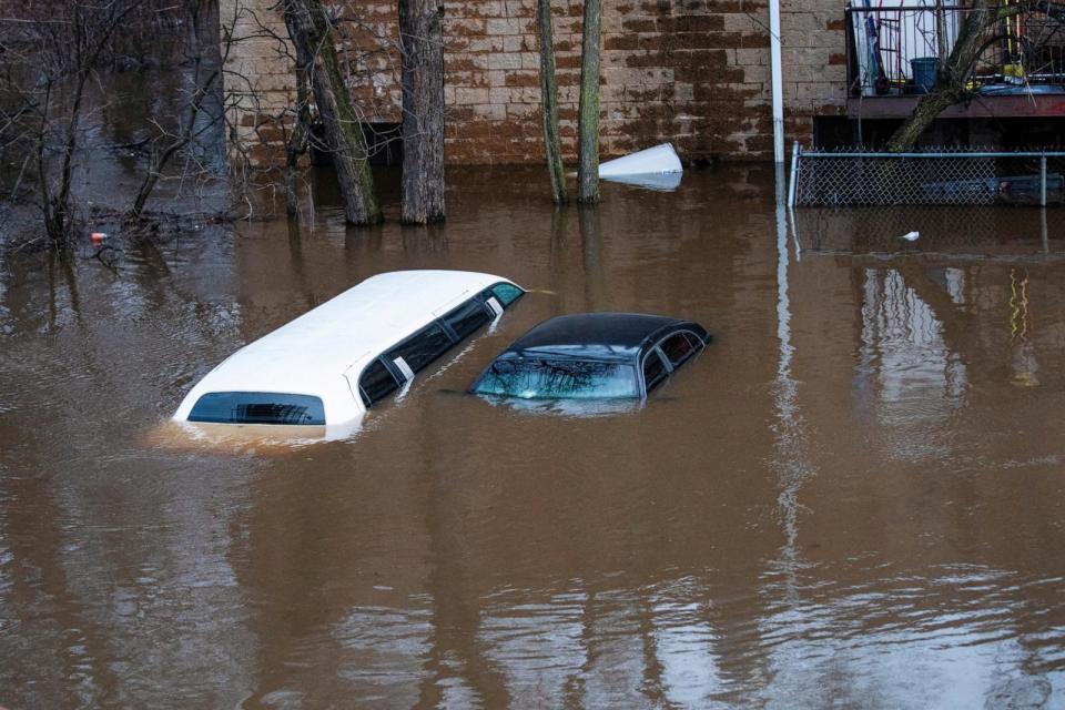 PHOTO: Cars are flooded in a local street during the pass of a winter storm, Jan. 10, 2024, in Lodi, N.J. (Eduardo Munoz/Reuters)