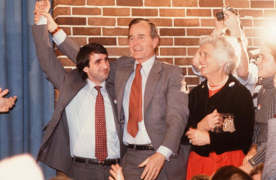 George H.W. and Barbara Bush celebrate with an unidentified man at an Iowa event during the future president's unsuccessful run for the Republican presidential nomination&nbsp;in January 1980.