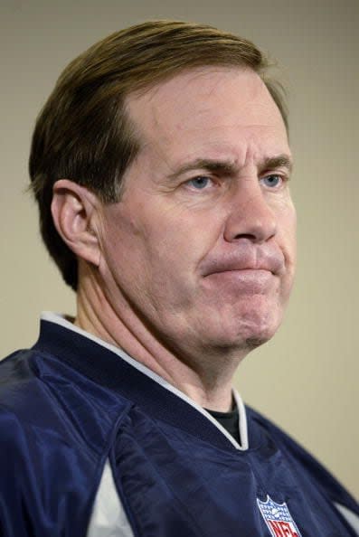 HOUSTON - JANUARY 26:  Head coach Bill Belichick of the New England Patriots answers questions from the media January 26, 2003 at the Houston Convention Center before Super Bowl XXXVIII against the Carolina Panthers in Houston, Texas.  (Photo by Brian Bahr/Getty Images)