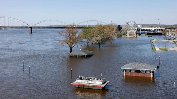 PHOTO: Floodwaters from the Mississippi River inundate LeClaire Park, April 27, 2023, in Davenport, Iowa. (Nikos Frazier/Quad City Times via AP)