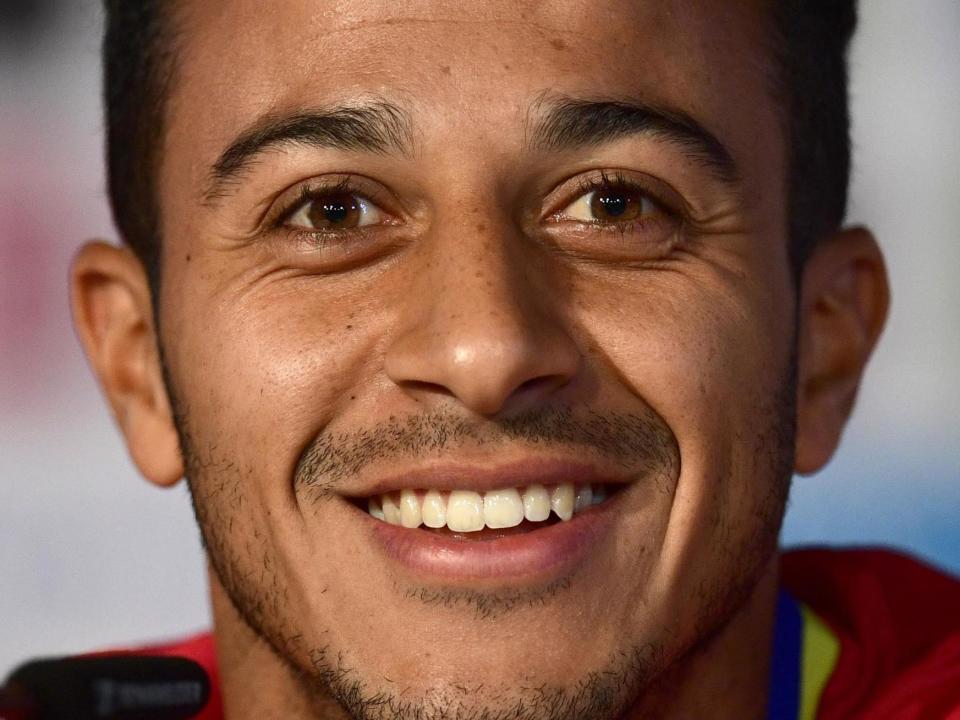 Thiago Alcantara attends a press conference: AFP via Getty Images