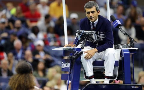 Serena Williams of the United States discusses a coaching violation warning given by umpire Carlos Ramos - Credit: Getty Images