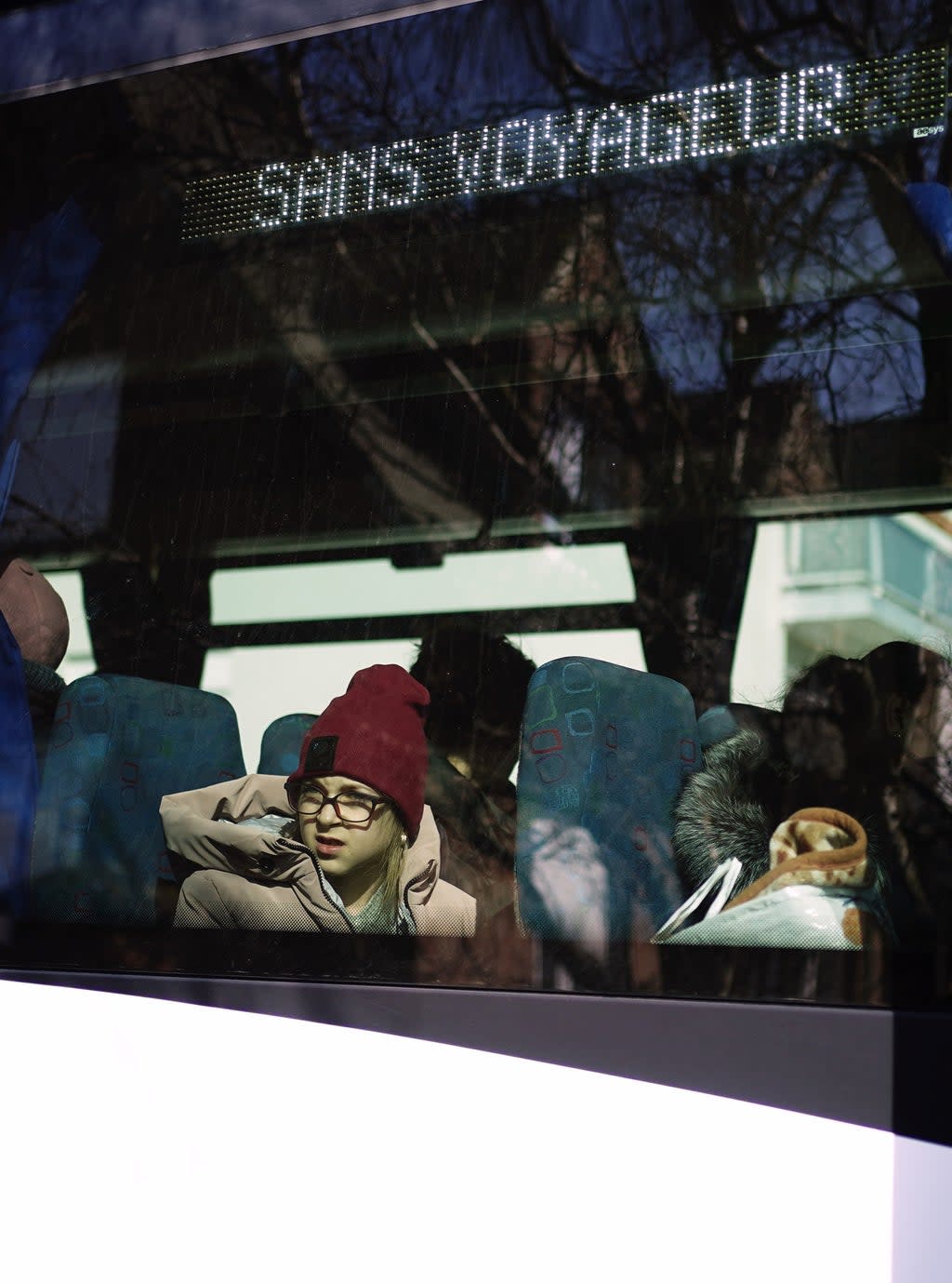 Ukrainian refugees sit on board a bus before it departs Calais (Aaron Chown/PA) (PA Wire)