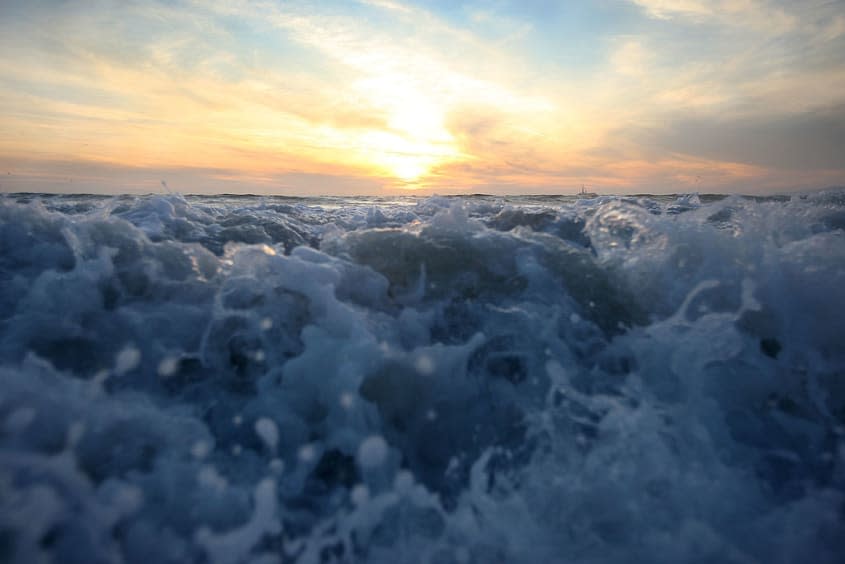 Waves break off the California coast.