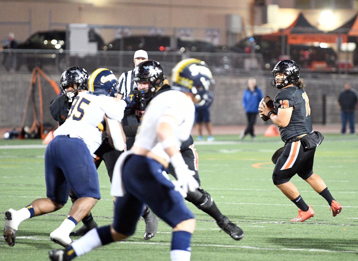 Ventura College quarterback Samuel Marquez drops back to pass against College of the Canyons on Saturday night at the VC Sportsplex. VC won 23-13.