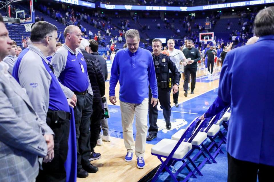 Kentucky head coach John Calipari exits the court after his team’s loss to Arkansas. “You’re not gonna win a game if they’re shooting 72 percent,” he said of the Razorbacks’ sizzling second half.