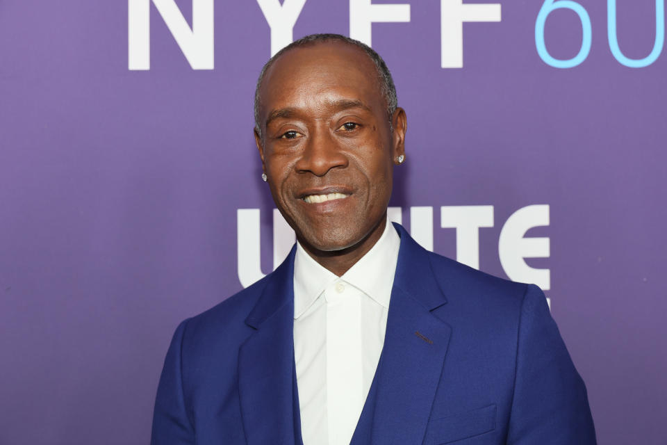 don cheadle smiling in a white shirt and blue blazer