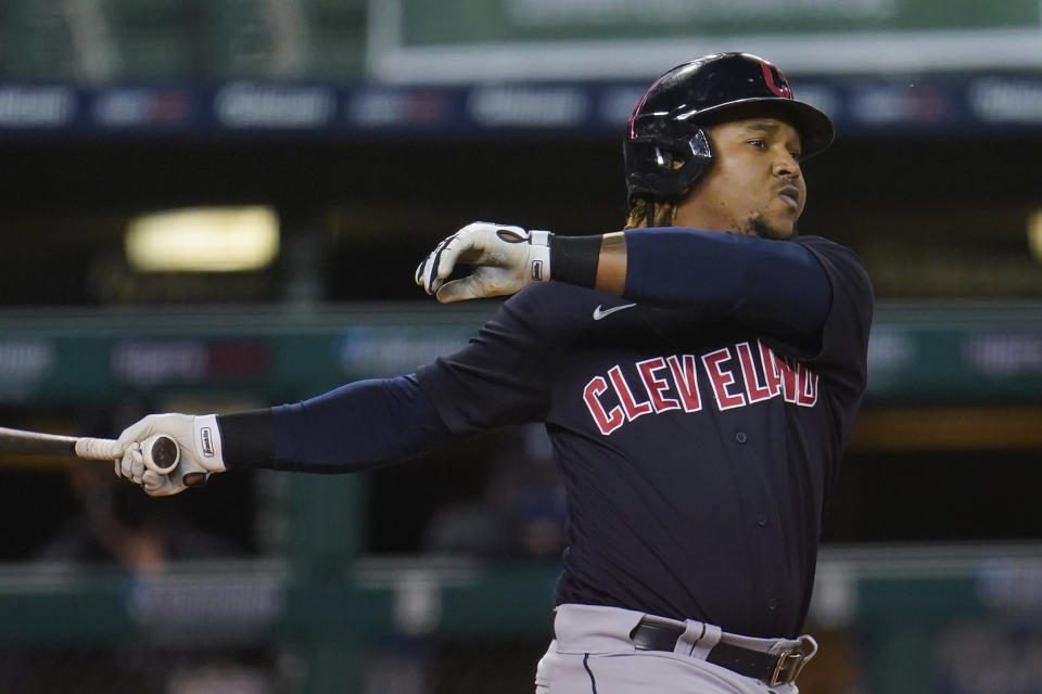 Cleveland Indians' Jose Ramirez (11) hits a two-run home run against the Detroit Tigers in the fourth inning of a baseball game in Detroit, Thursday, Sept. 17, 2020. (AP Photo/Paul Sancya)